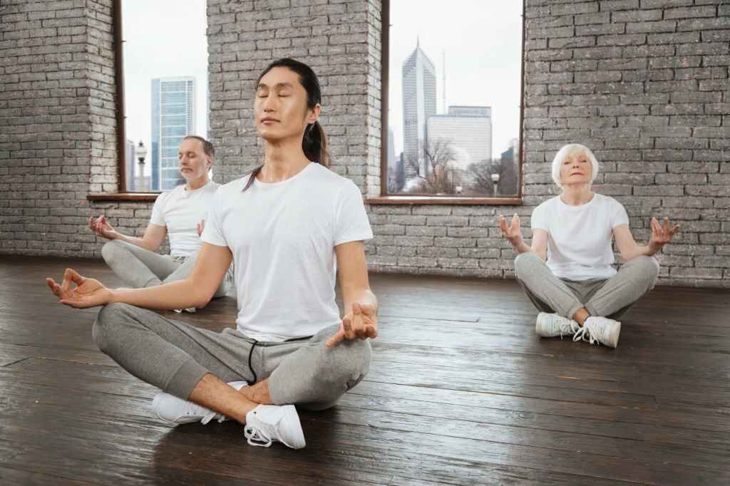 A group of people doing Meditation