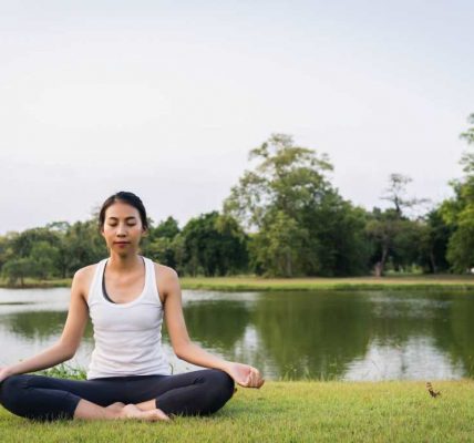 woman doing yoga outdoors
