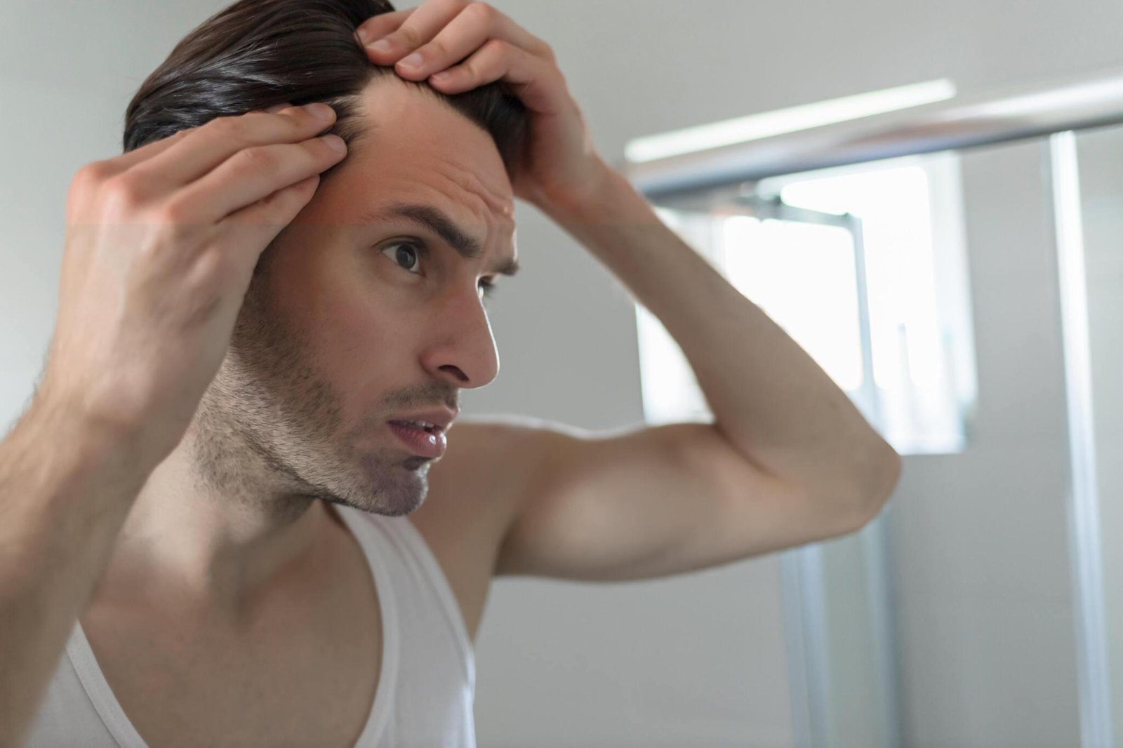 man worrying About Hair Loss